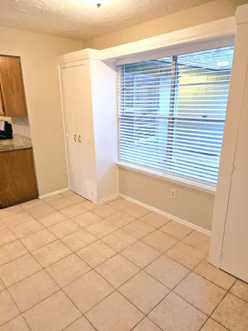 a view of a room with a window