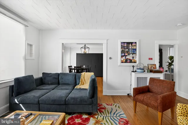 a living room with furniture and a couch