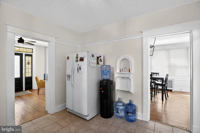 a view of a livingroom with furniture and front door