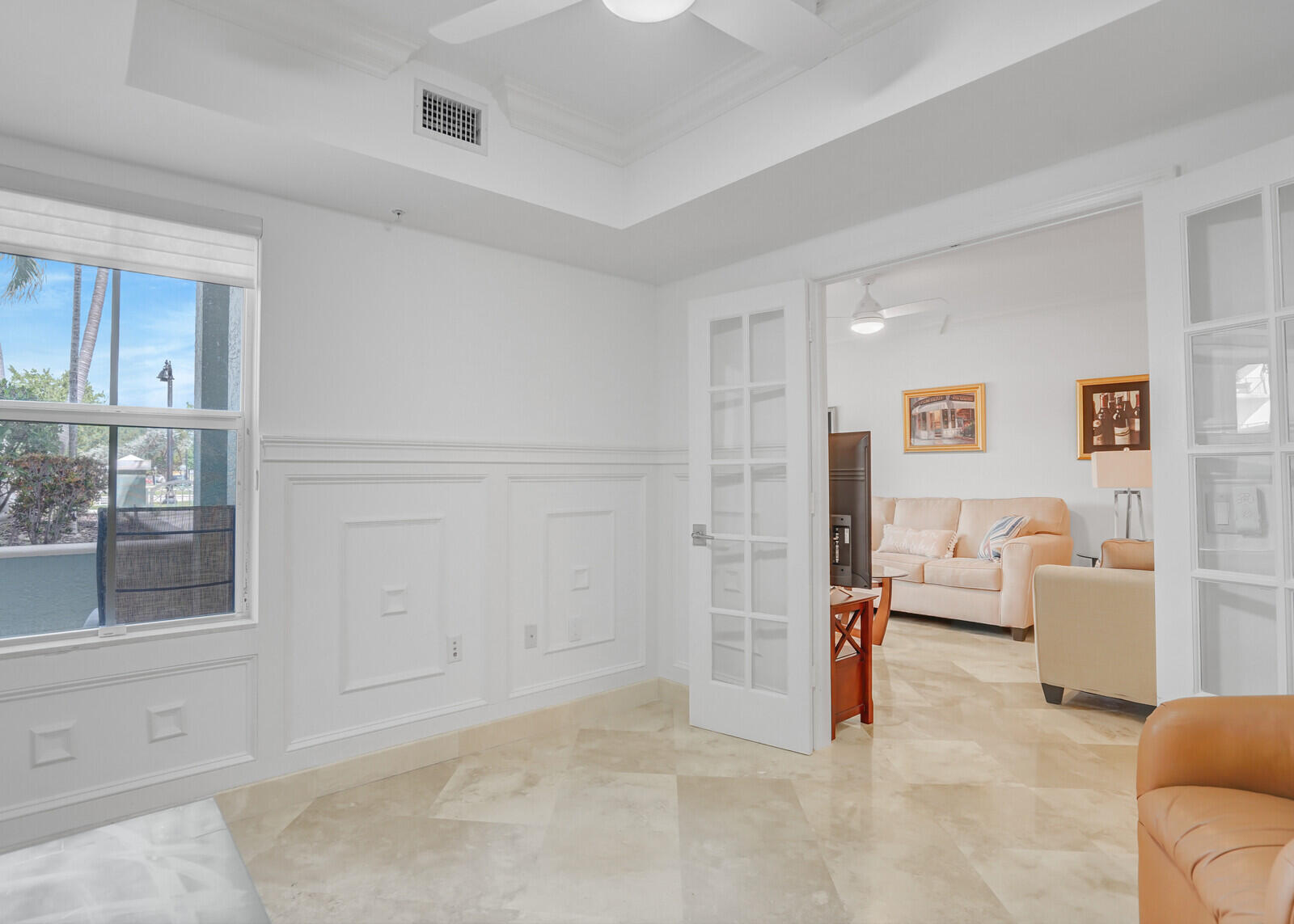 2051 Southeast 3rd Street, Unit TH7 Deerfield Beach, FL 33441 - Photo 12 of 48 a living room with furniture and a window