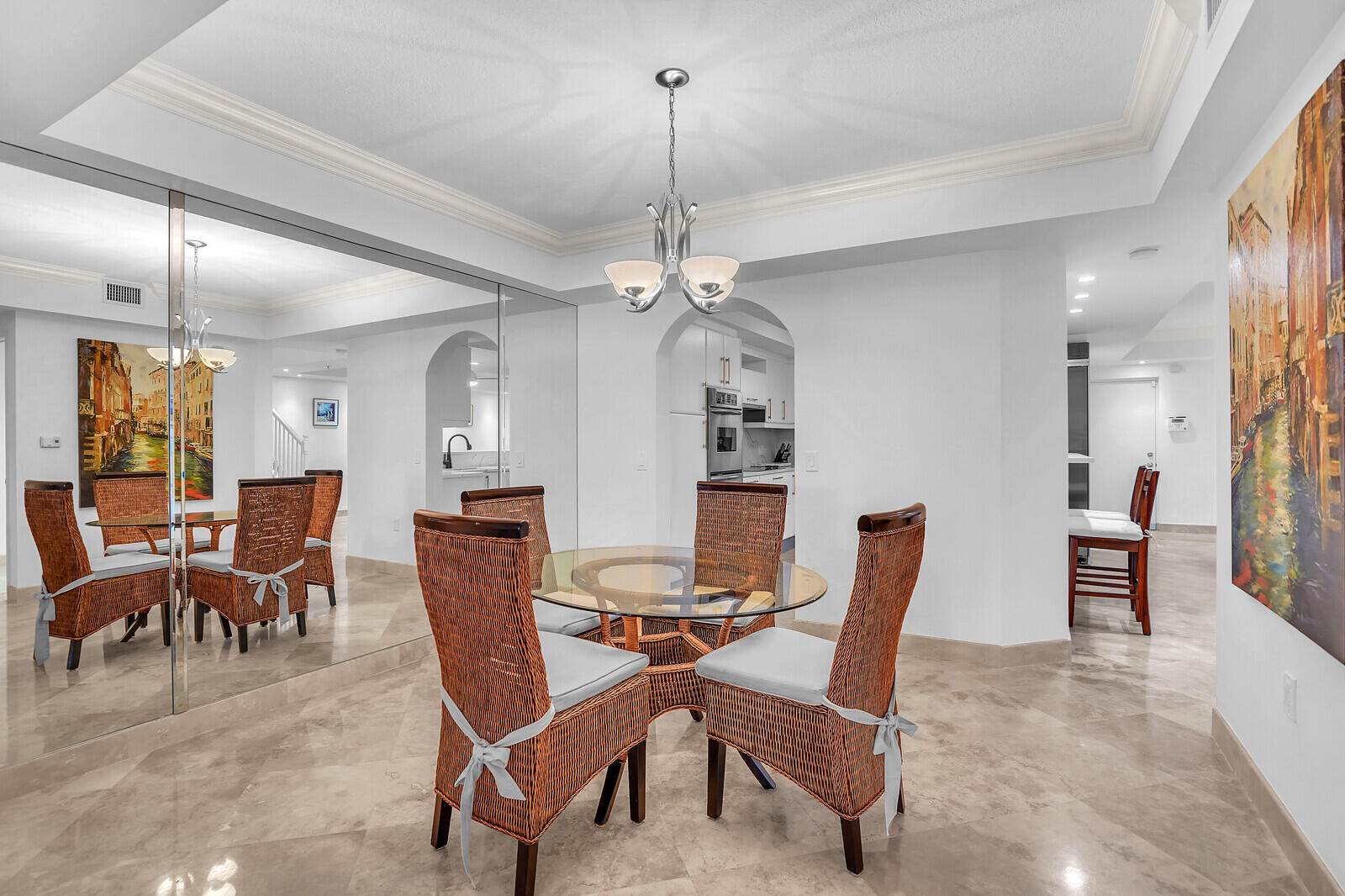 2051 Southeast 3rd Street, Unit TH7 Deerfield Beach, FL 33441 - Photo 14 of 48 a dining room with furniture a chandelier and window