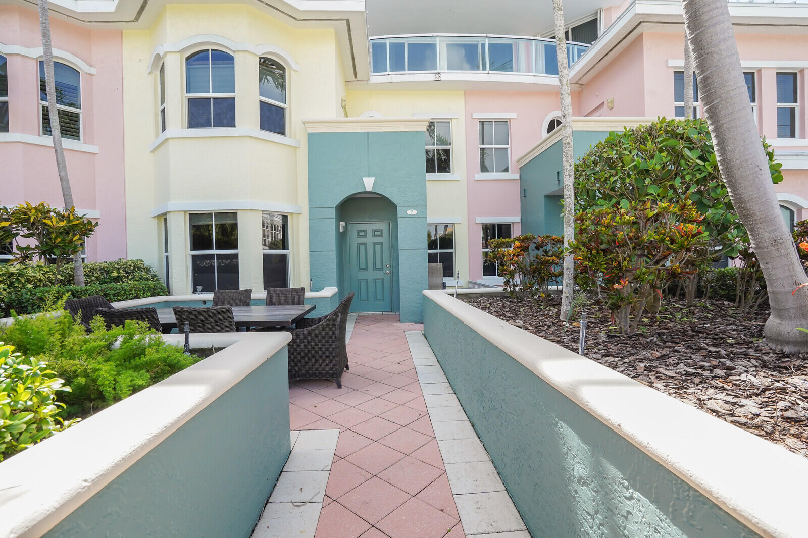 2051 Southeast 3rd Street, Unit TH7 Deerfield Beach, FL 33441 - Photo 2 of 48 a house view with a outdoor space