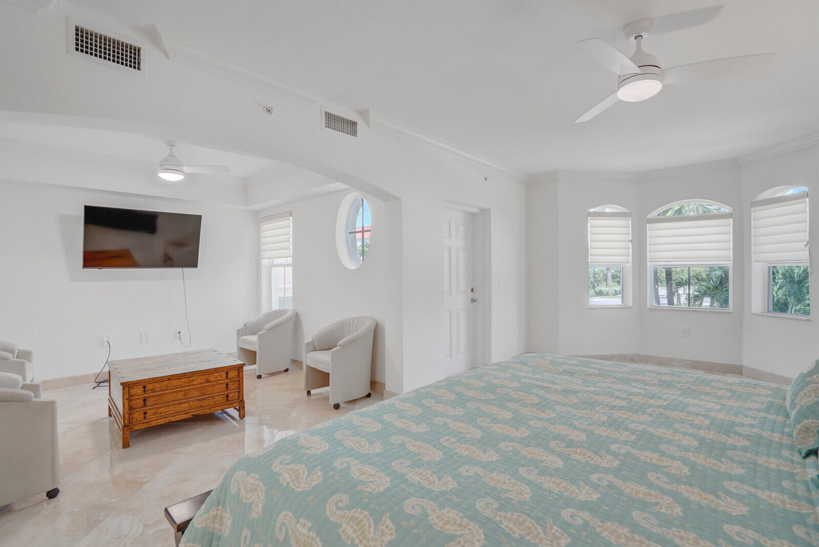 2051 Southeast 3rd Street, Unit TH7 Deerfield Beach, FL 33441 - Photo 28 of 48 a bedroom with furniture and a window