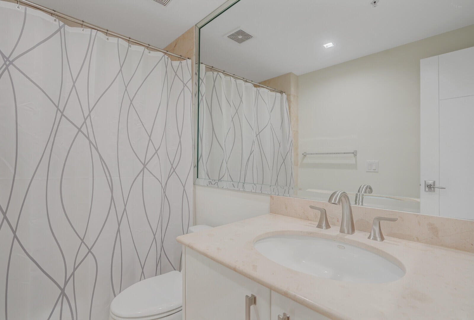 2051 Southeast 3rd Street, Unit TH7 Deerfield Beach, FL 33441 - Photo 32 of 48 a bathroom with a sink toilet and shower