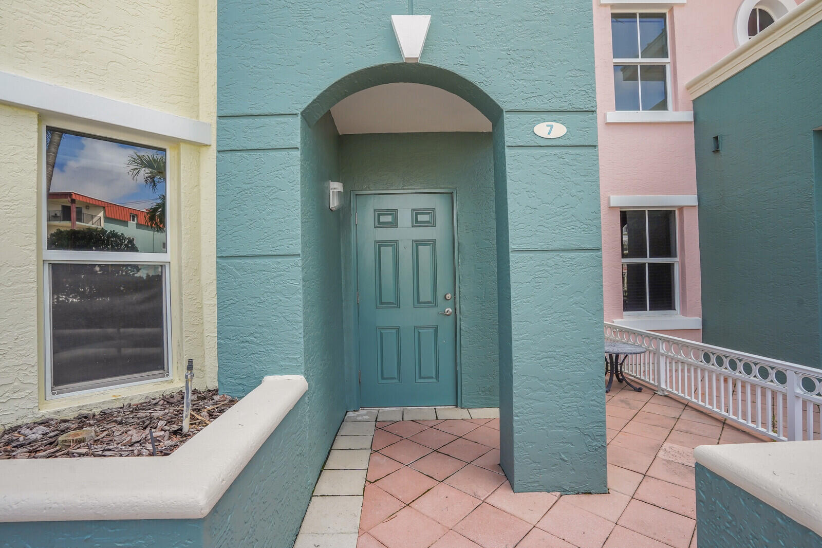 2051 Southeast 3rd Street, Unit TH7 Deerfield Beach, FL 33441 - Photo 6 of 48 a view of a entryway door of the house