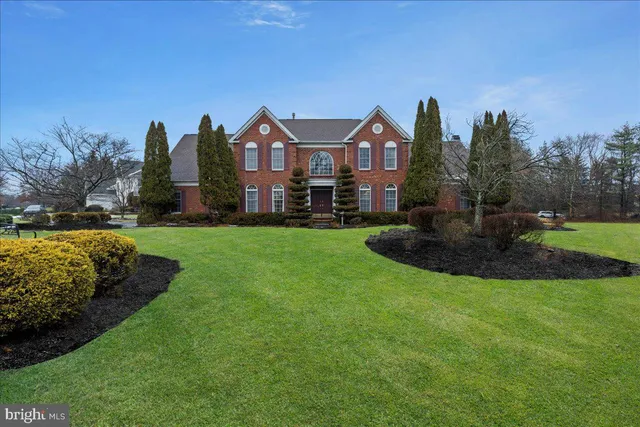 a view of a floor to ceiling window and a yard