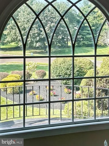 a view of a house with a tree