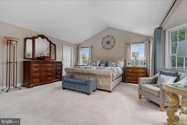 a view of balcony with wooden floor and outdoor seating