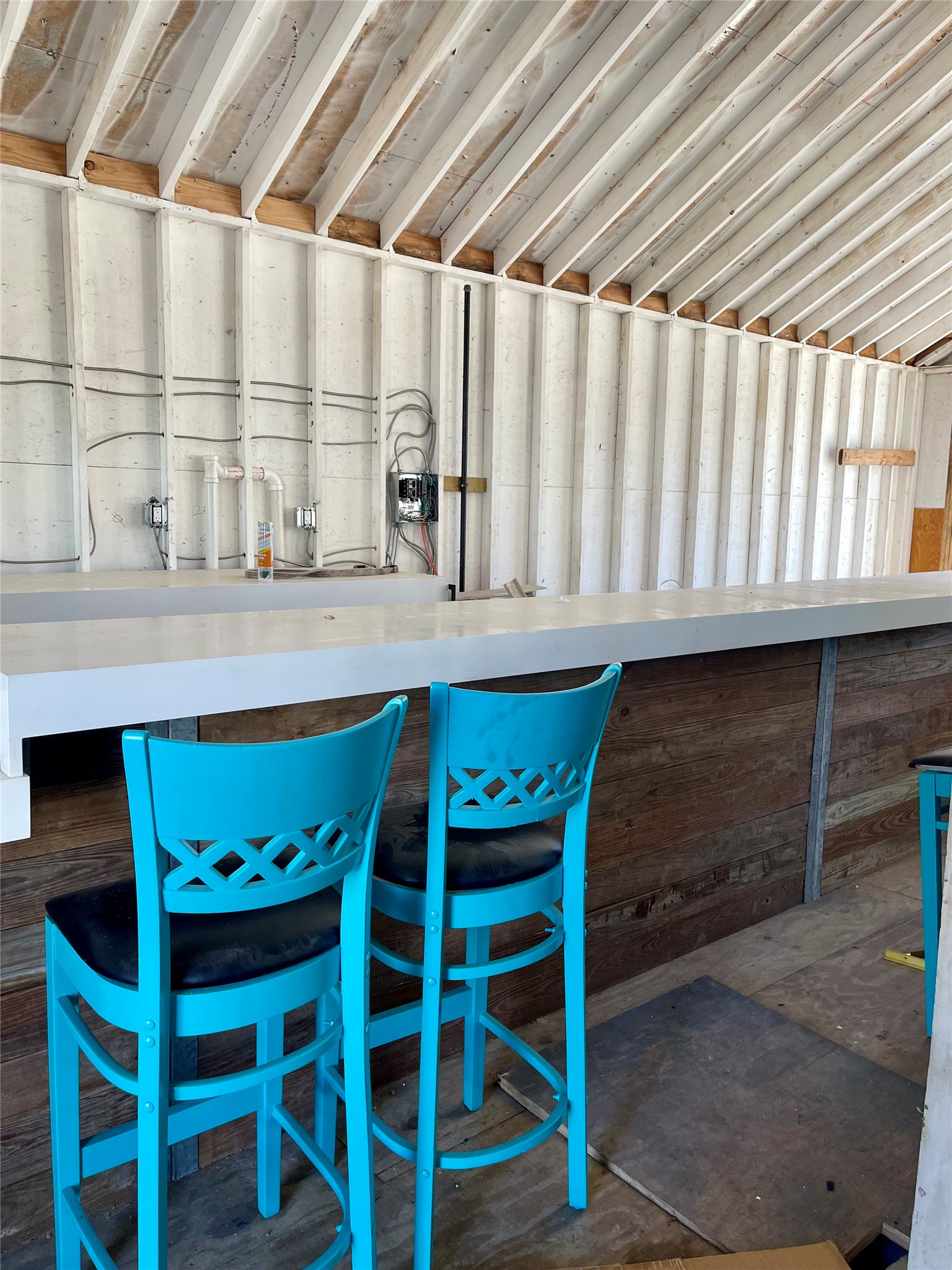 1807 Lawrence Street Houston, TX 77008 - Photo 10 of 10 a table with chairs and a wine table