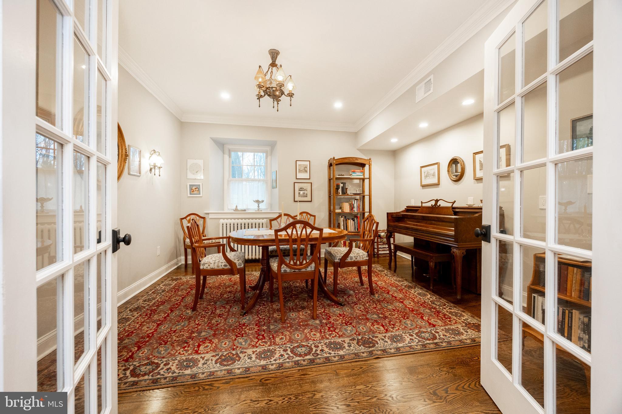 57 Grubb Road Malvern, PA 19355 - Photo 17 of 45 a view of a dining room with furniture a rug and wooden floor