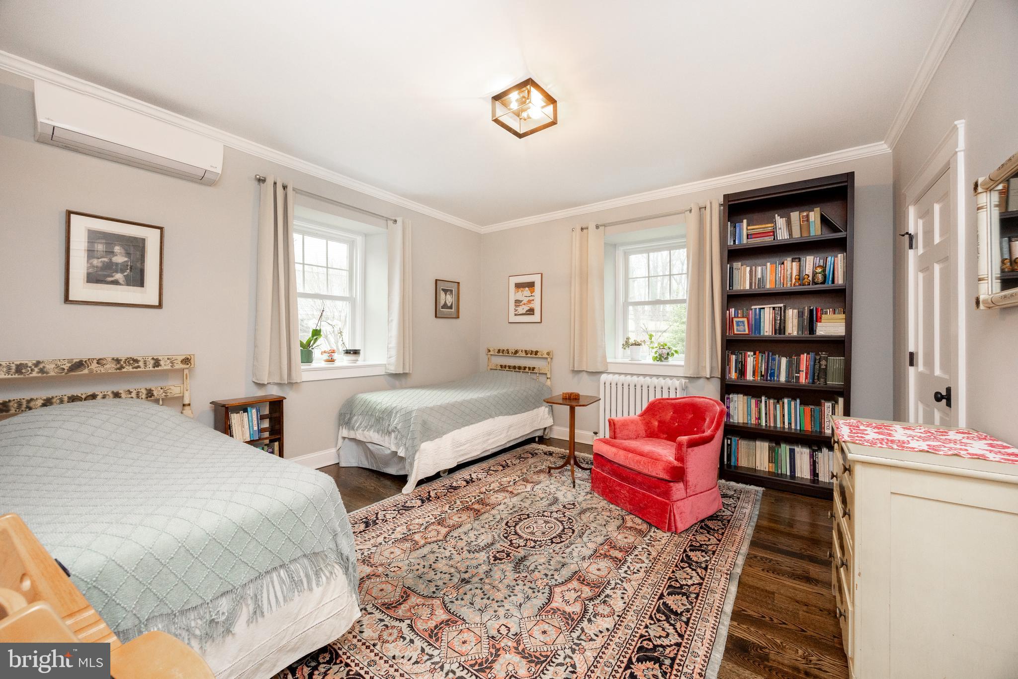 57 Grubb Road Malvern, PA 19355 - Photo 18 of 45 a bedroom with two beds and a book shelf