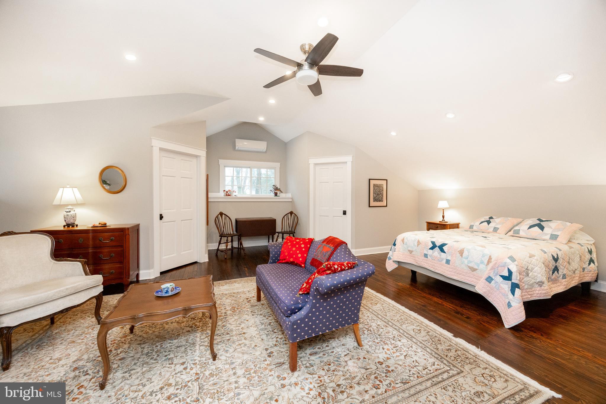 57 Grubb Road Malvern, PA 19355 - Photo 23 of 45 a bedroom with a bed mirror and couch