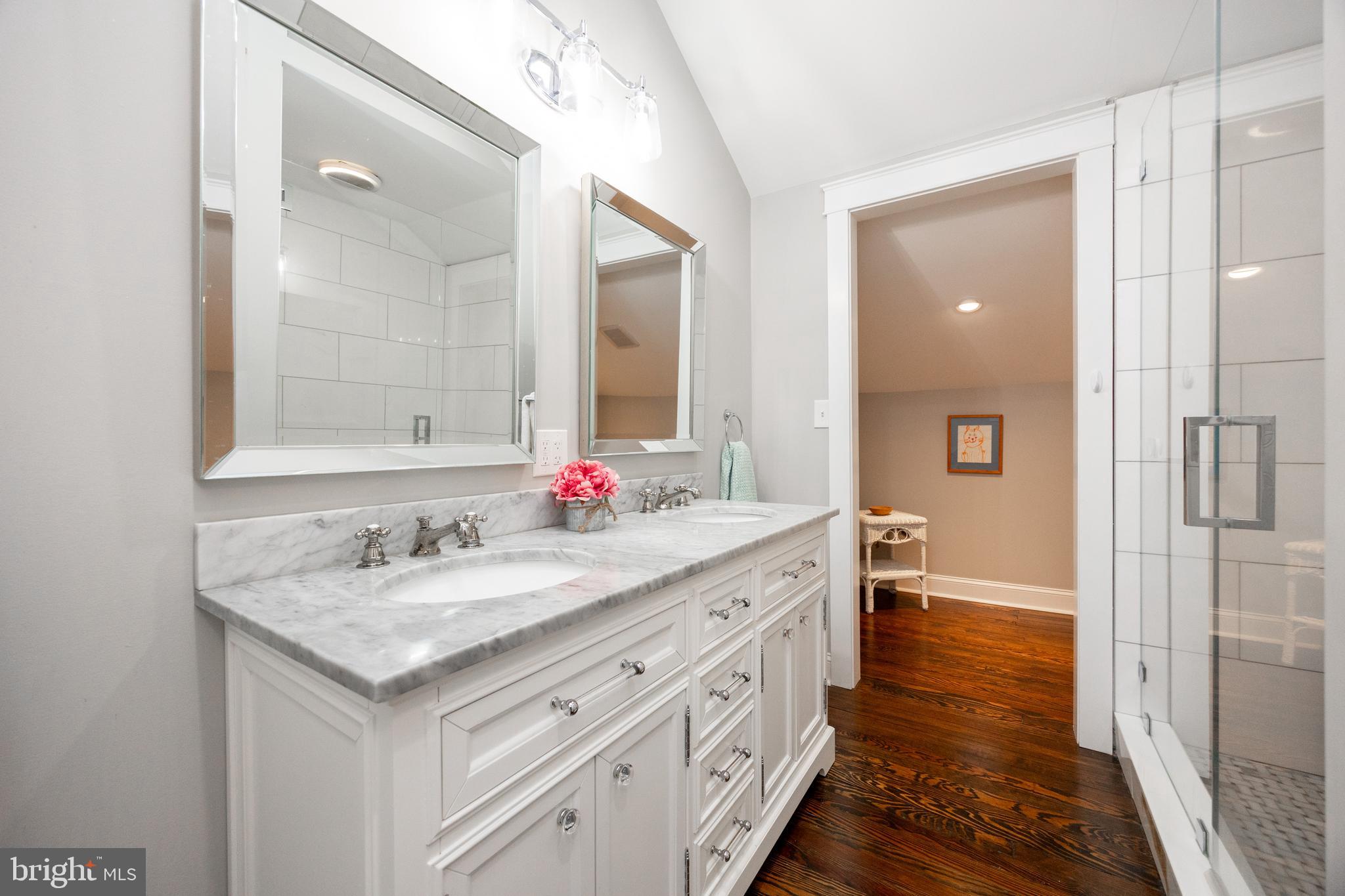 57 Grubb Road Malvern, PA 19355 - Photo 25 of 45 a bathroom with a sink double vanity and a mirror