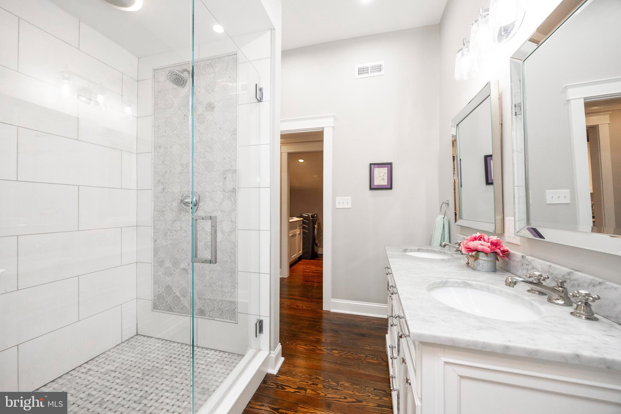 57 Grubb Road Malvern, PA 19355 - Photo 26 of 45 a bathroom with a sink and a mirror