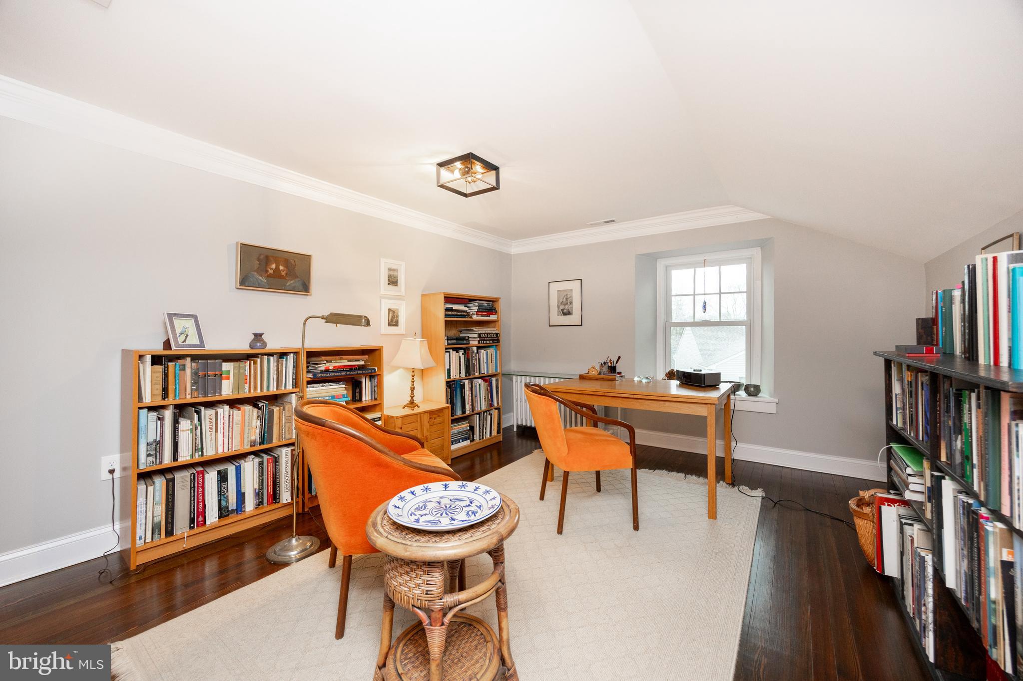57 Grubb Road Malvern, PA 19355 - Photo 30 of 45 a dining room with furniture and a book shelf