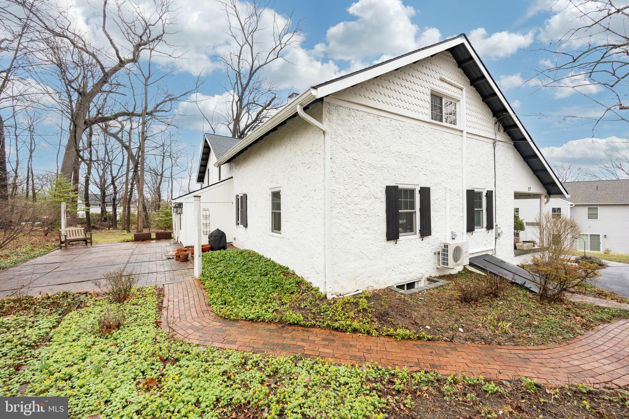 57 Grubb Road Malvern, PA 19355 - Photo 32 of 45 a view of a white house with a yard