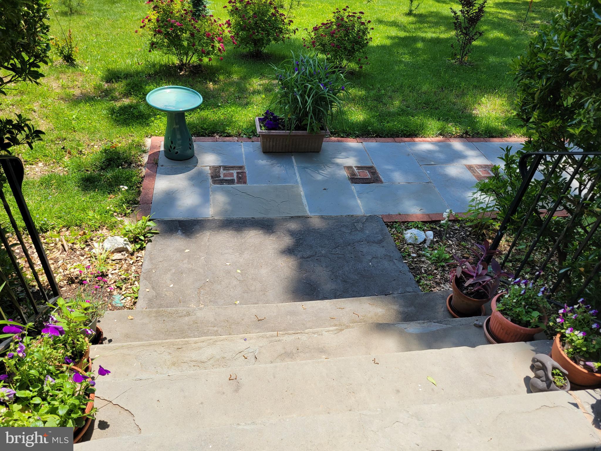 57 Grubb Road Malvern, PA 19355 - Photo 41 of 45 a view of a garden with a fountain