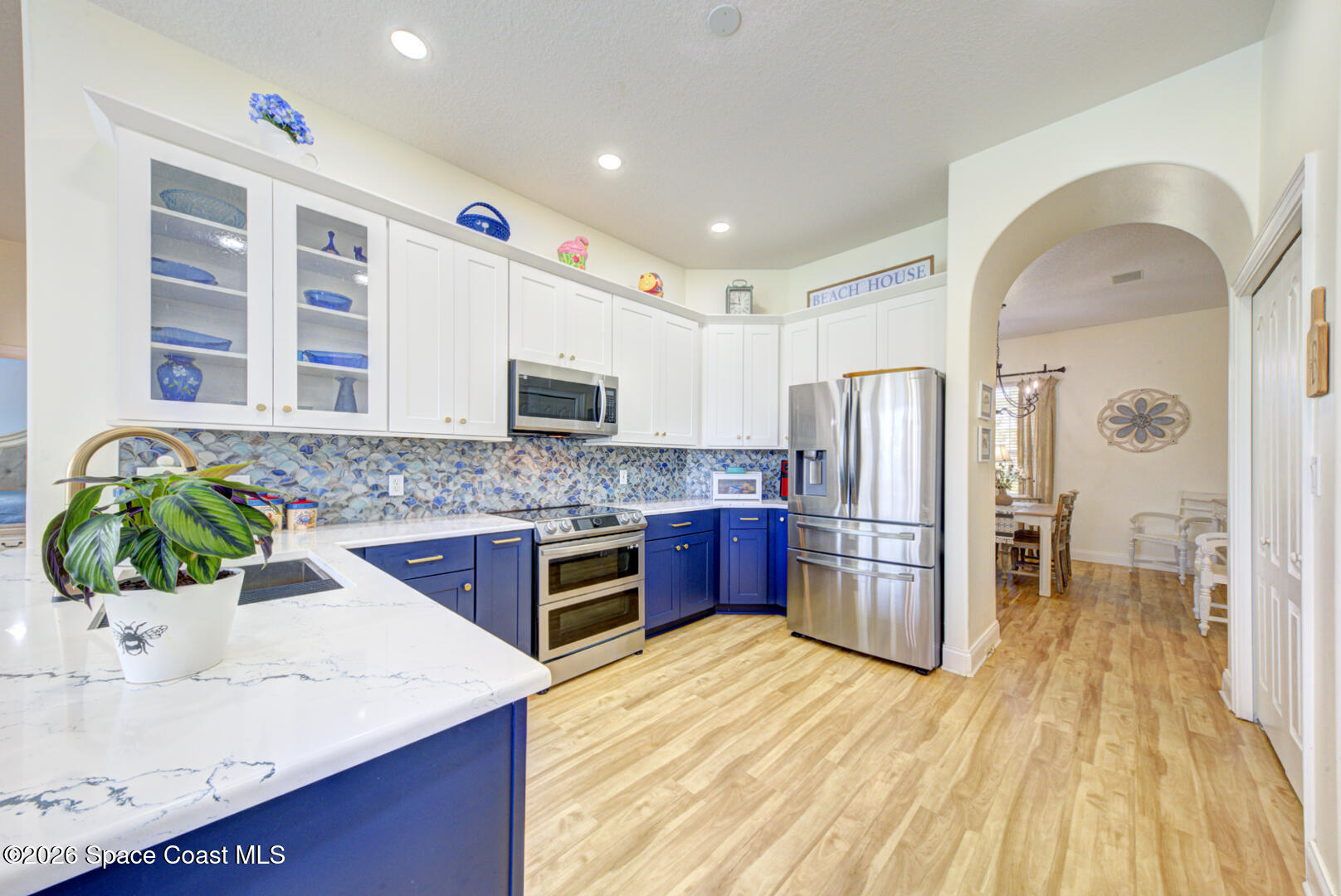 4056 Sand Ridge Drive Merritt Island, FL 32953 - Photo 18 of 69 kitchen with arched doorway