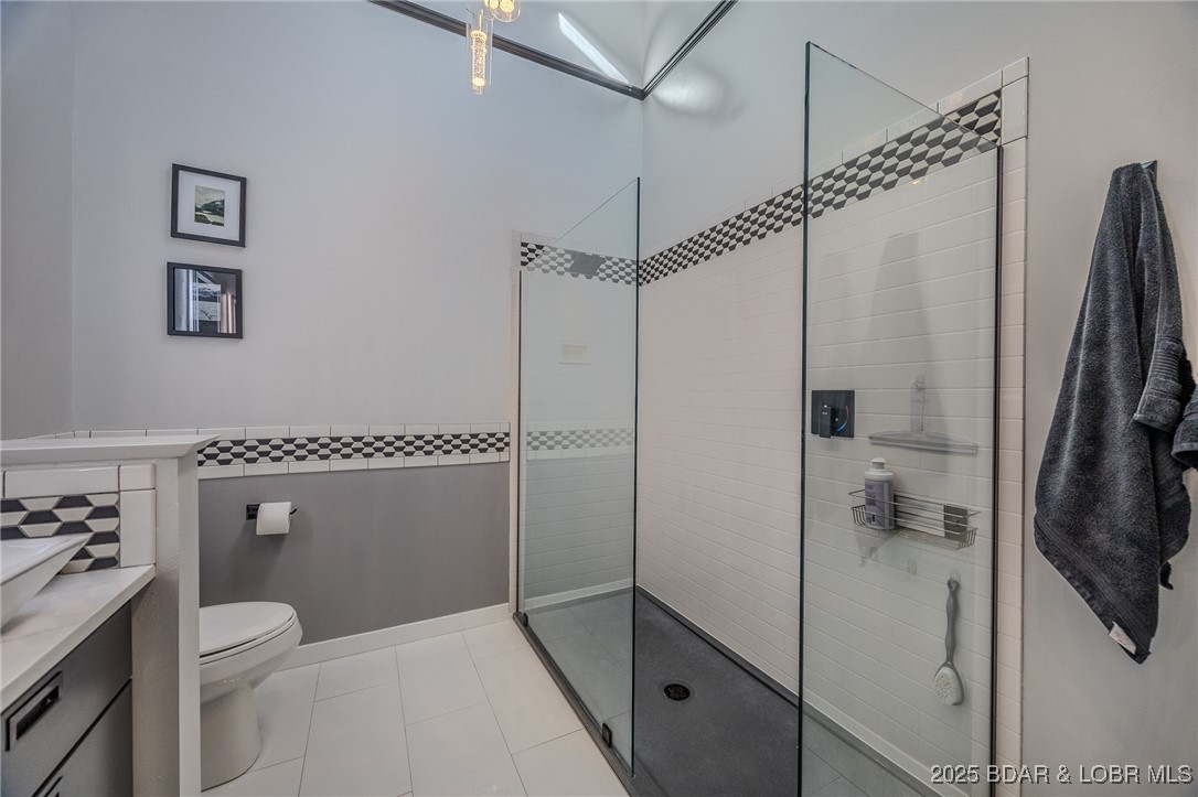 2259 Standing Rock Road Camdenton, MO 65020 - Photo 24 of 75 A stunning walk-in shower featuring contemporary,