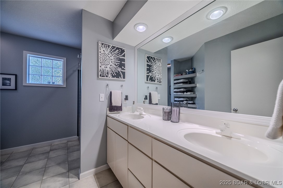 2259 Standing Rock Road Camdenton, MO 65020 - Photo 29 of 75 Dual vanities offer sophisticated functionality, s
