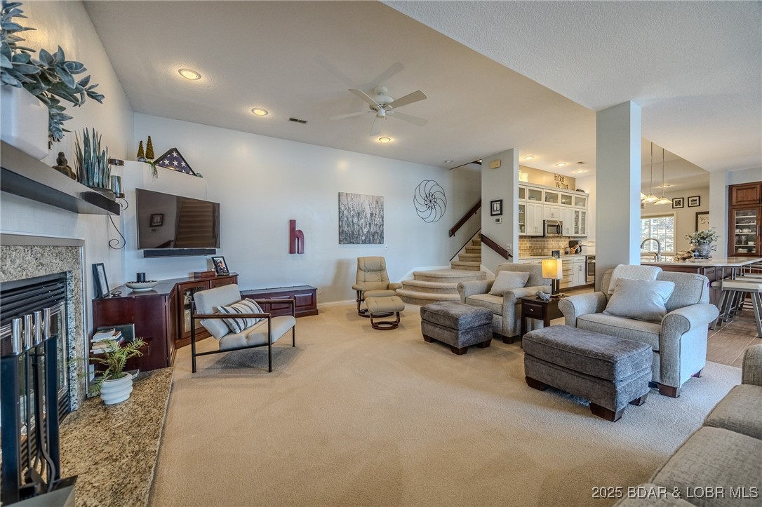 2259 Standing Rock Road Camdenton, MO 65020 - Photo 39 of 75 This living room is bright, open, and beautifully