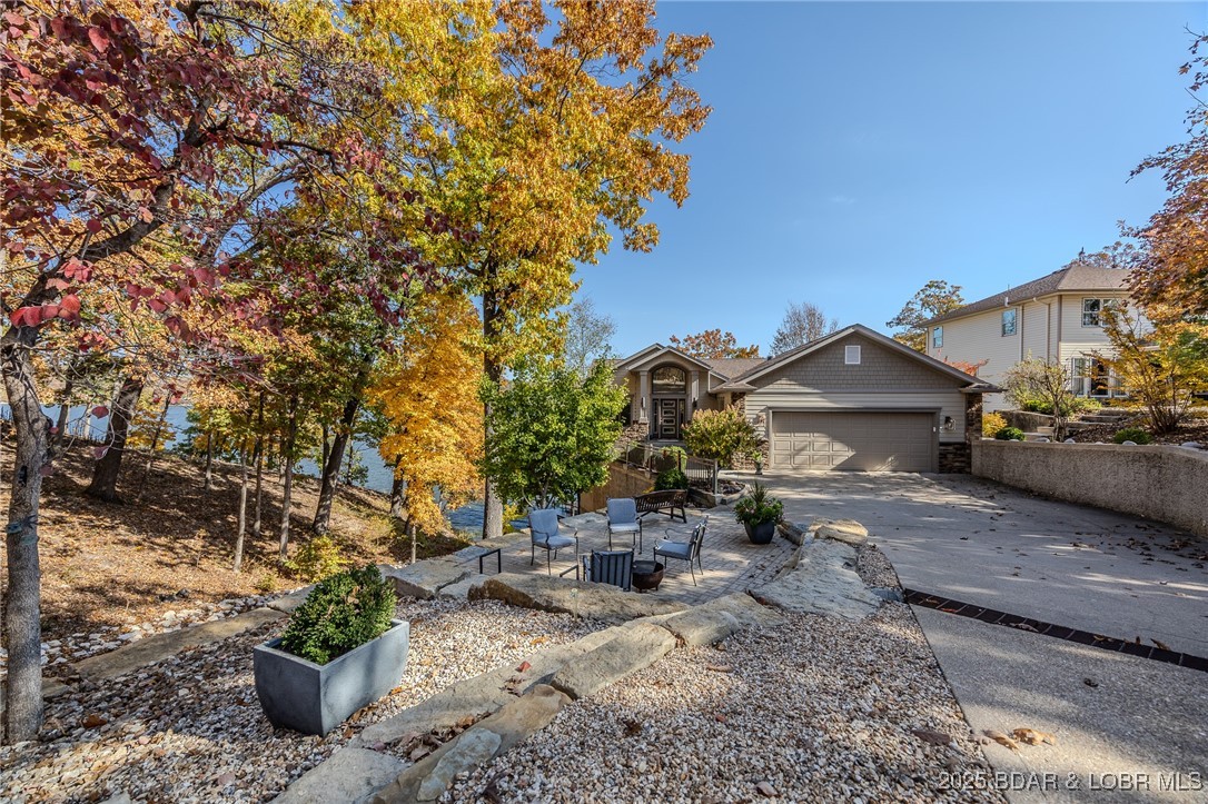 2259 Standing Rock Road Camdenton, MO 65020 - Photo 5 of 75 The beautifully designed landscaping complements t