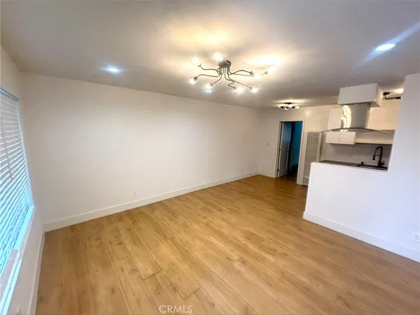 a view of a kitchen with a dishwasher and cabinets