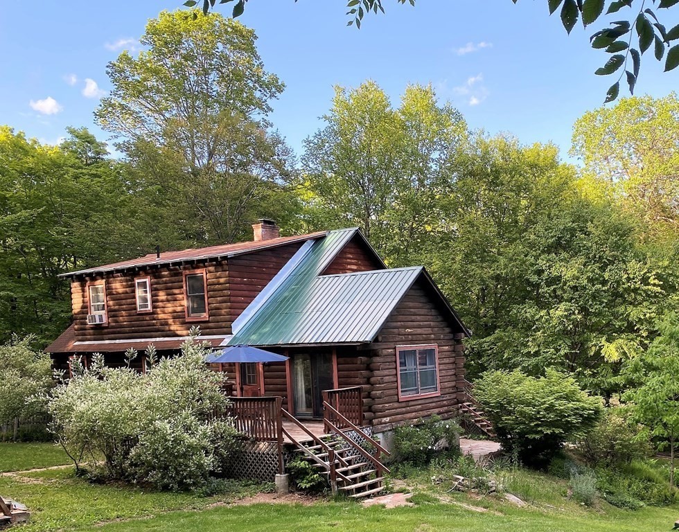 266 Alexander Road Leyden, MA 01337 - Photo 1 of 33 a house view with a garden space