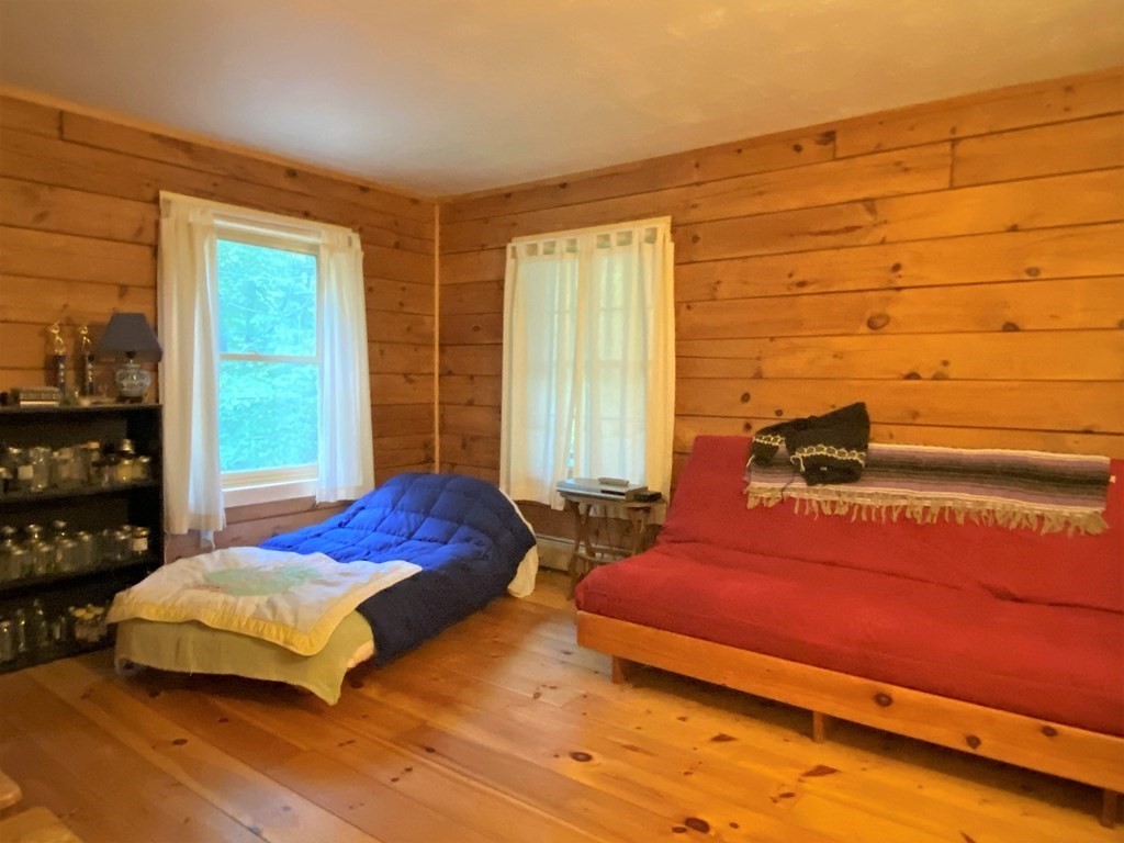 266 Alexander Road Leyden, MA 01337 - Photo 21 of 33 a bedroom with a bed and a window