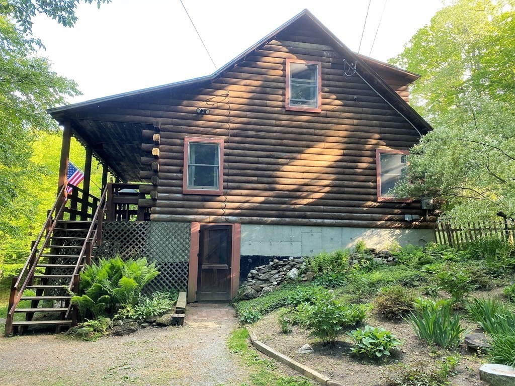 266 Alexander Road Leyden, MA 01337 - Photo 25 of 33 a front view of a house with garden