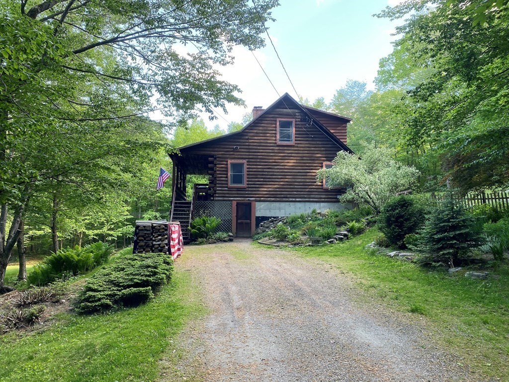 266 Alexander Road Leyden, MA 01337 - Photo 4 of 33 a front view of a house with garden