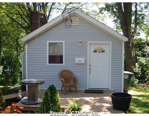 149 Millard Street Torrington, CT 06790 - Photo 1 of 1 a front view of house with yard and outdoor seating
