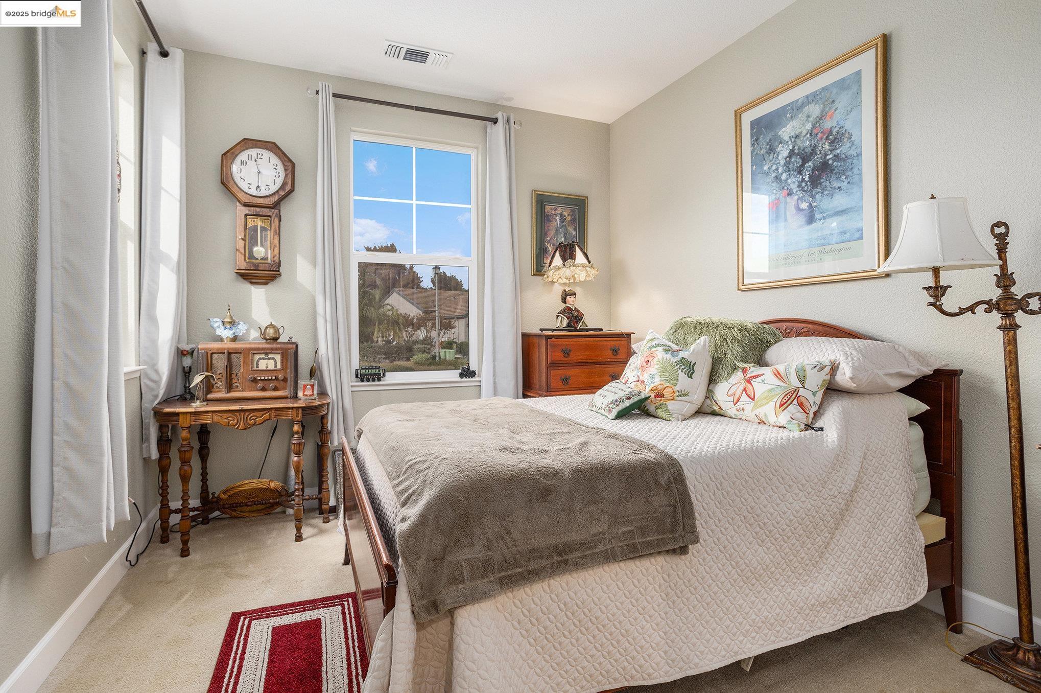 299 Marks Road Rio Vista, CA 94571 - Photo 18 of 39 Bedroom featuring light carpet and baseboards