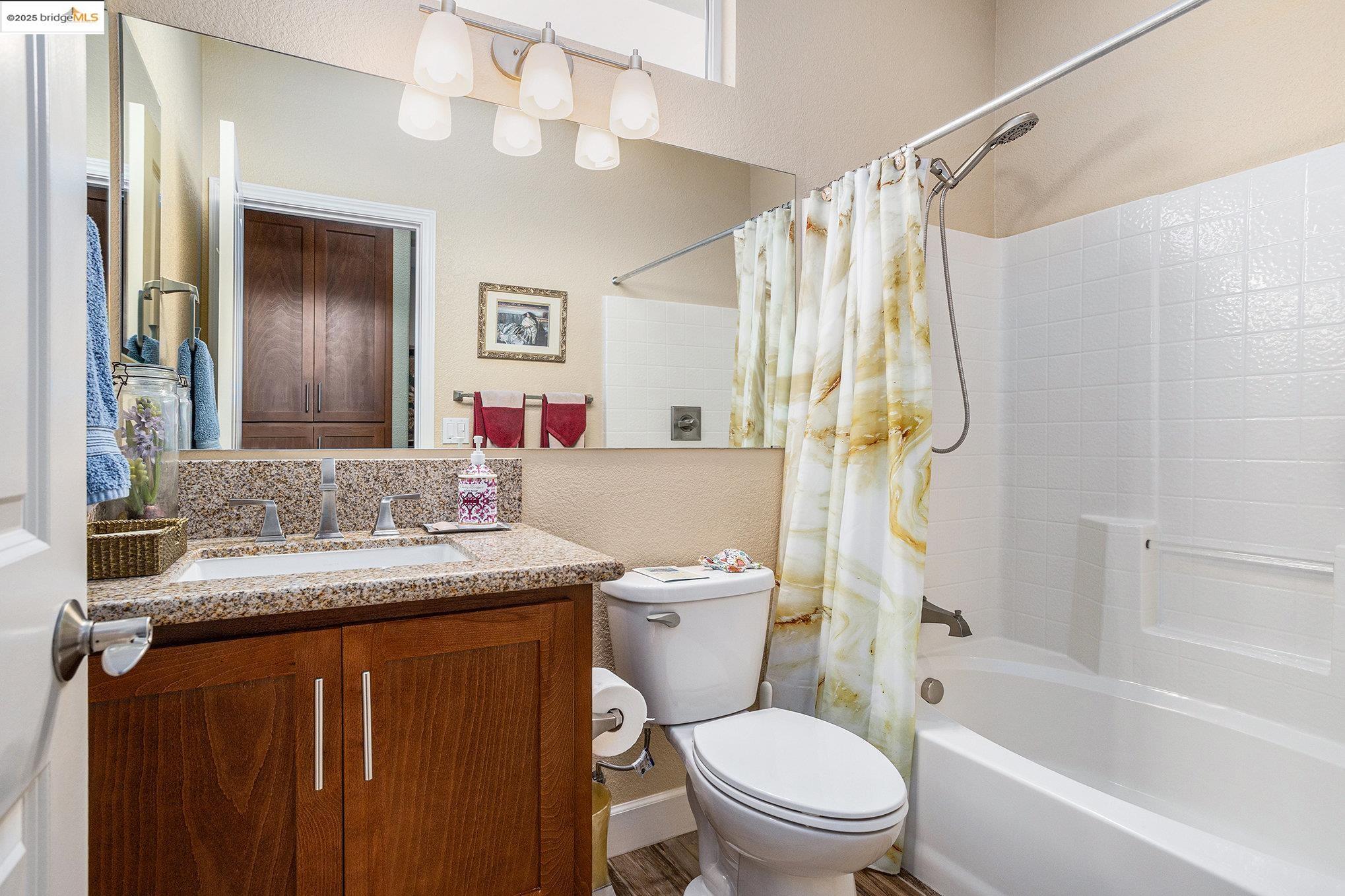 299 Marks Road Rio Vista, CA 94571 - Photo 19 of 39 Full bathroom featuring shower / bath combo with shower curtain and vanity