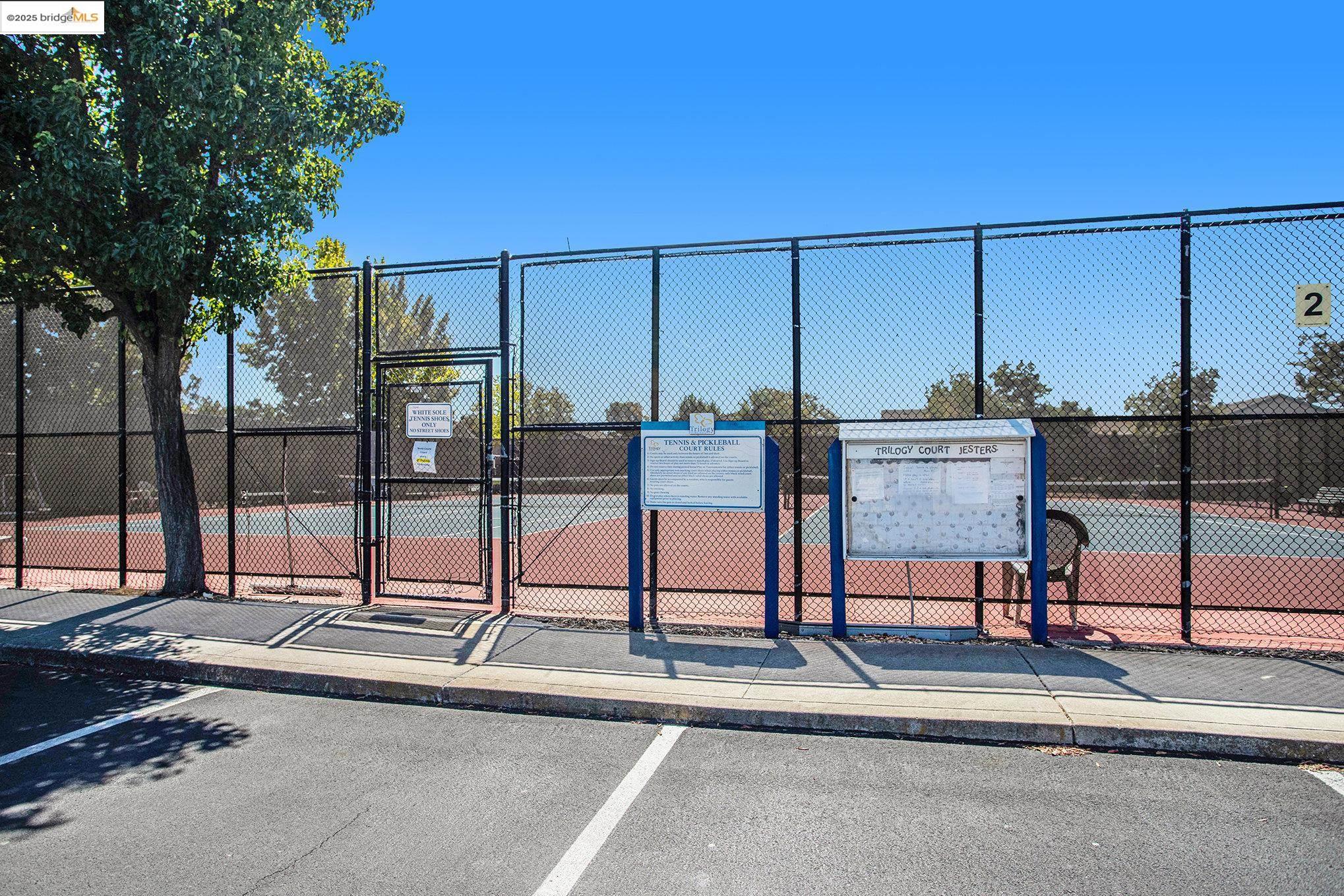 299 Marks Road Rio Vista, CA 94571 - Photo 28 of 39 View of tennis court featuring a gate