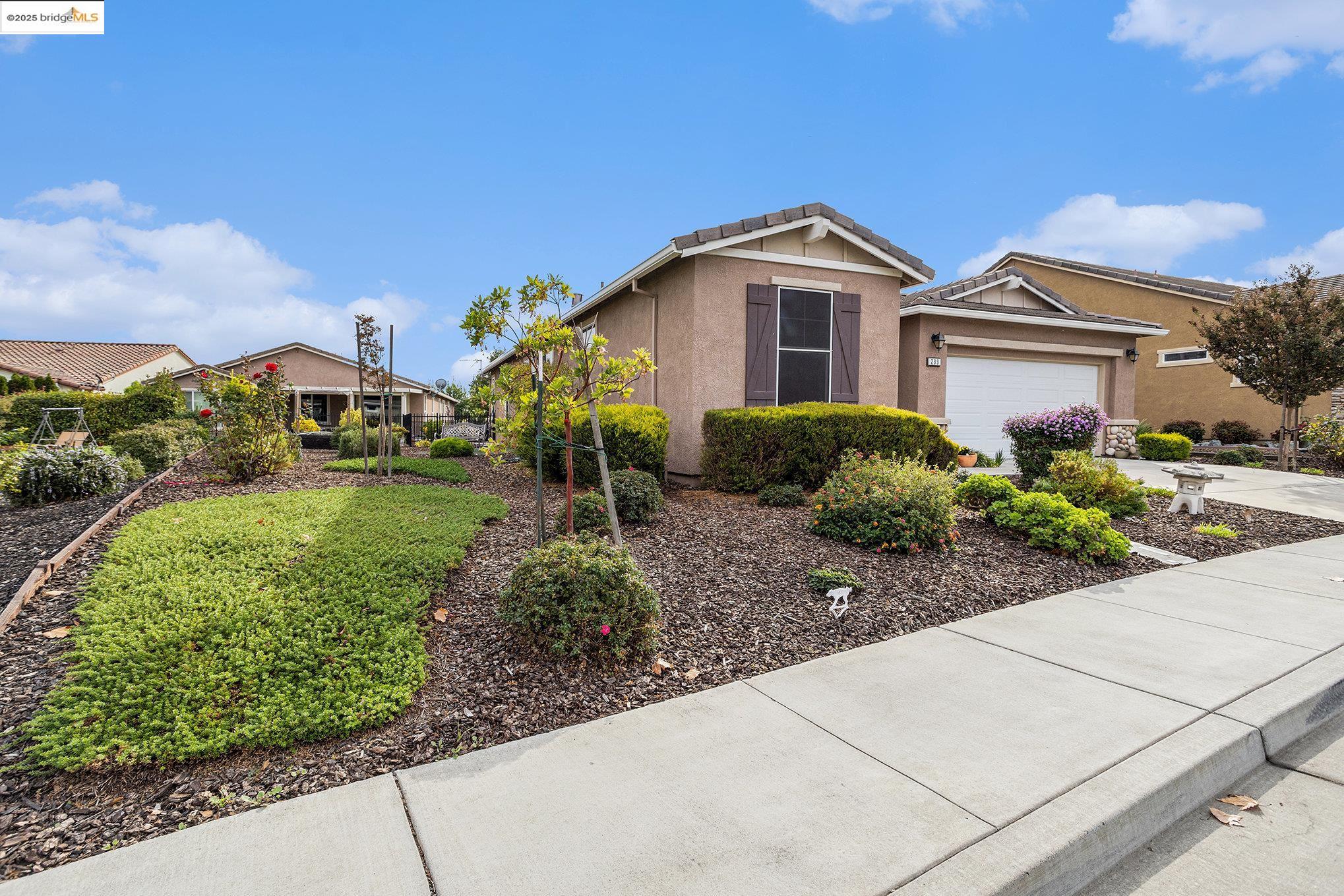 299 Marks Road Rio Vista, CA 94571 - Photo 3 of 39 Single story home featuring stucco siding, driveway, a garage, and a tiled roof