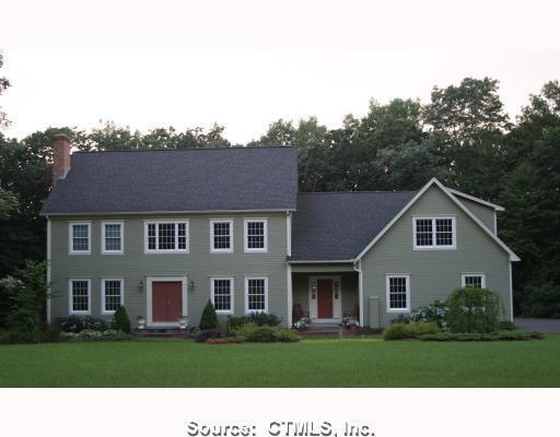 Exterior Front. Professionally landscaped yard w/ in-ground sprinker system in front