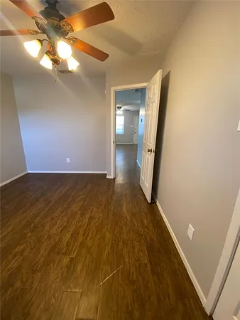 a view of a livingroom with wooden floor