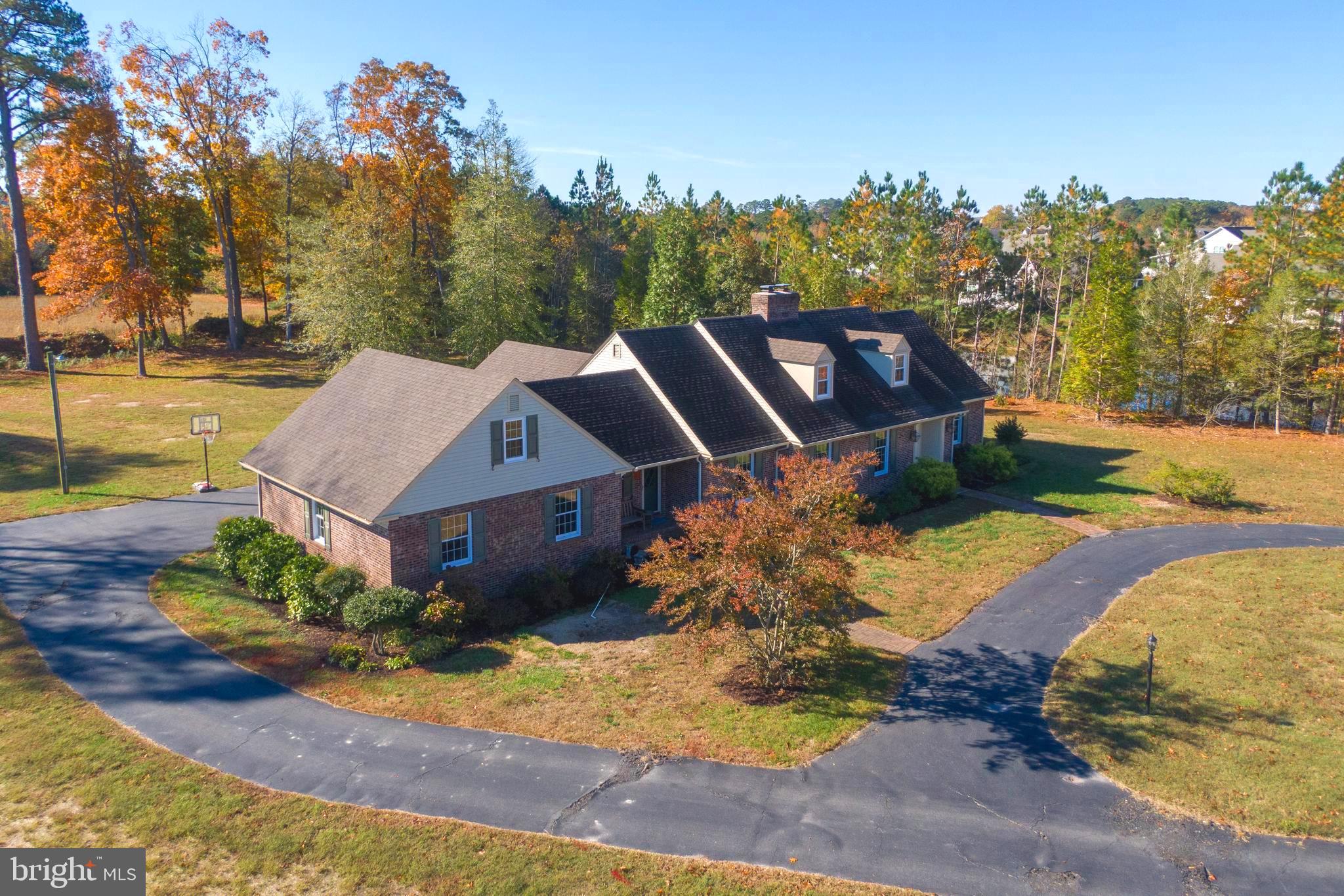 930 Johnson Road Salisbury, MD 21804 - Photo 1 of 69 an aerial view of a house with a yard and large trees