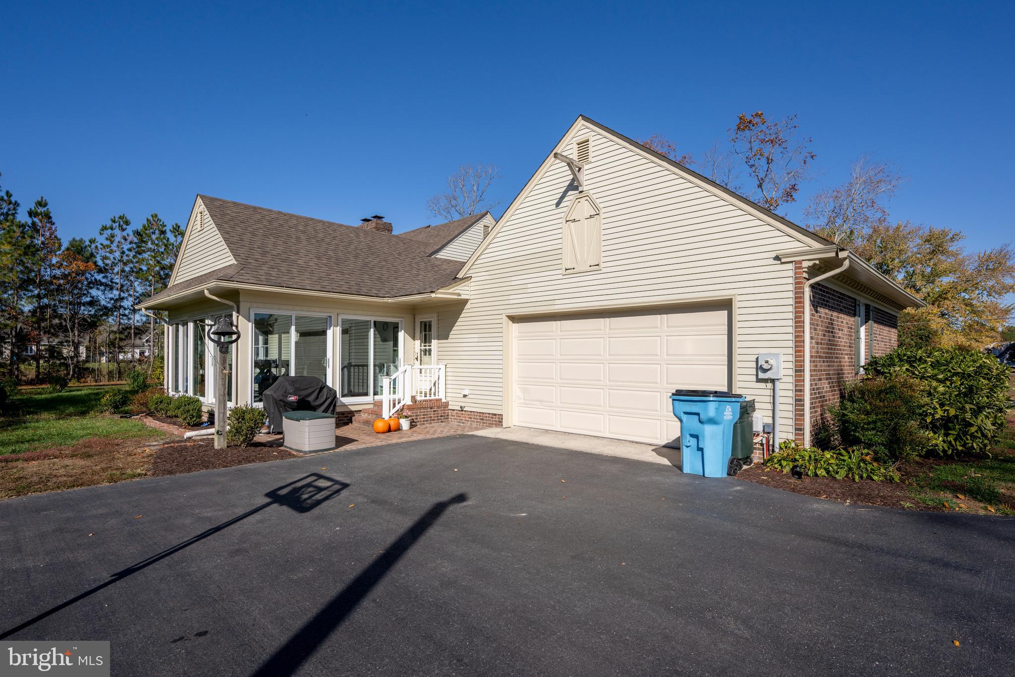 930 Johnson Road Salisbury, MD 21804 - Photo 18 of 69 a view of a house with backyard sitting area and garden