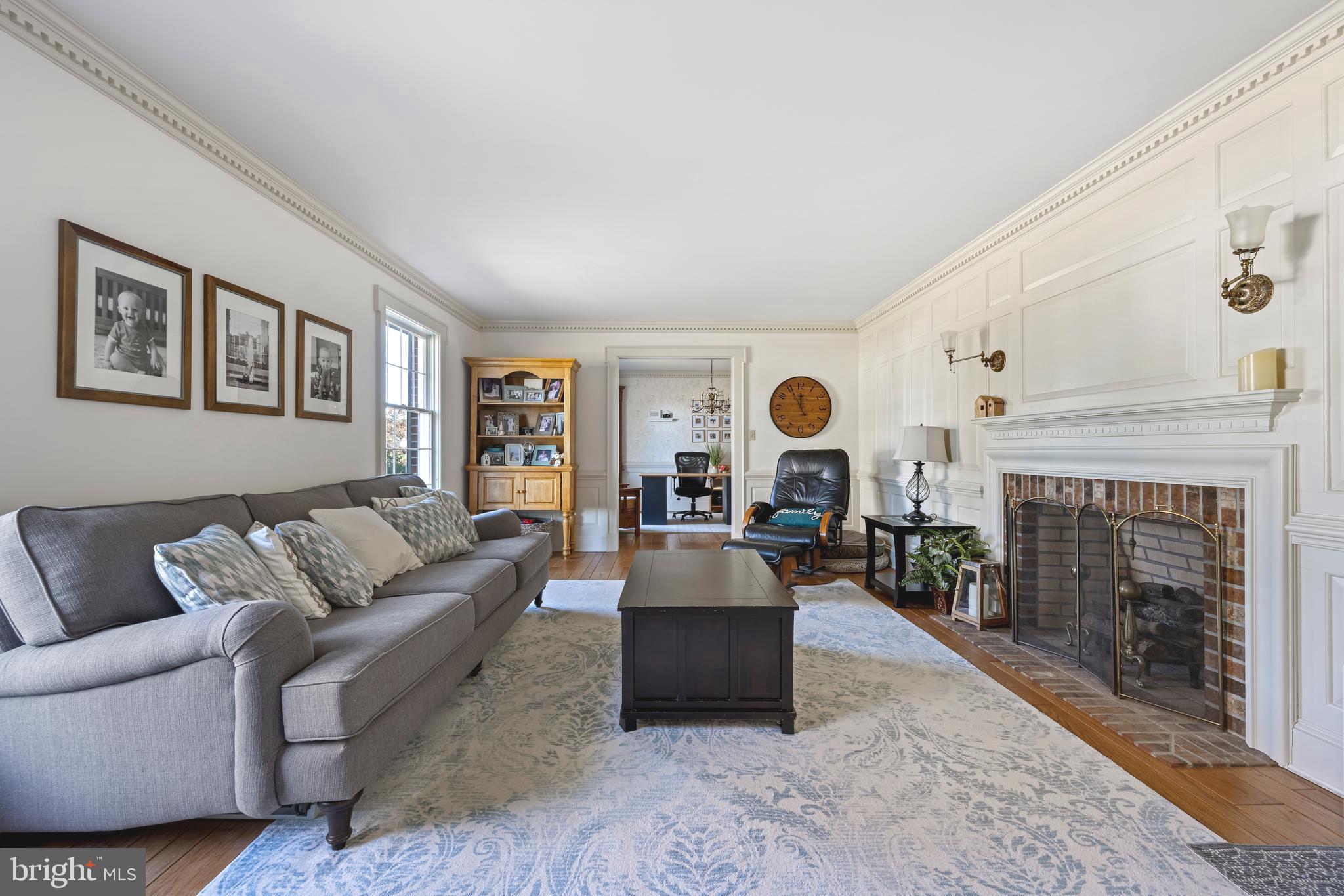 930 Johnson Road Salisbury, MD 21804 - Photo 37 of 69 a living room with furniture and a fireplace