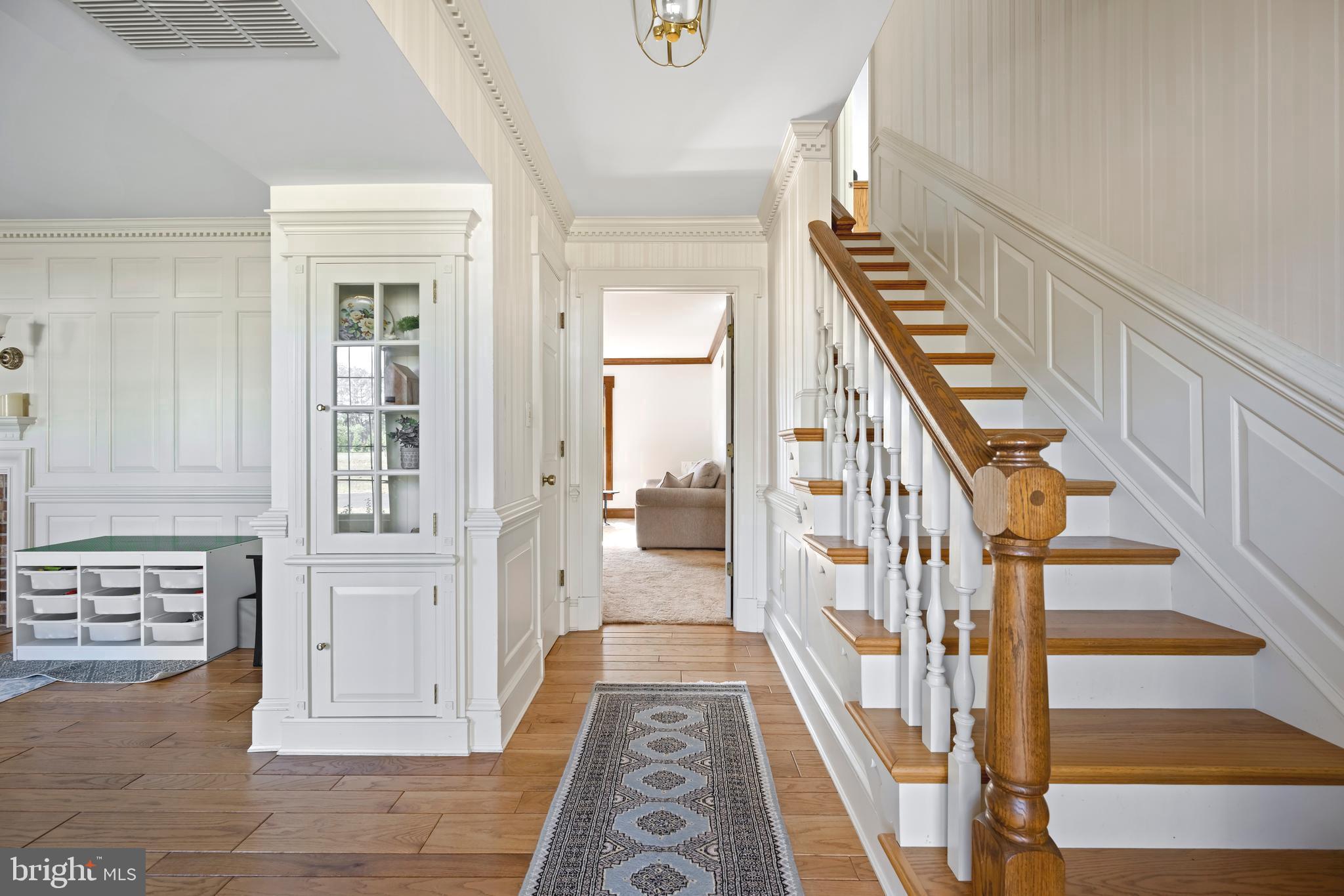 930 Johnson Road Salisbury, MD 21804 - Photo 40 of 69 a view of an entryway with wooden floor and stairs
