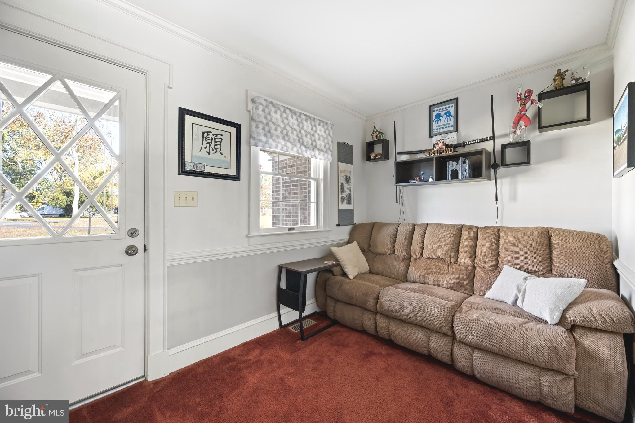 930 Johnson Road Salisbury, MD 21804 - Photo 48 of 69 a living room with furniture and a window