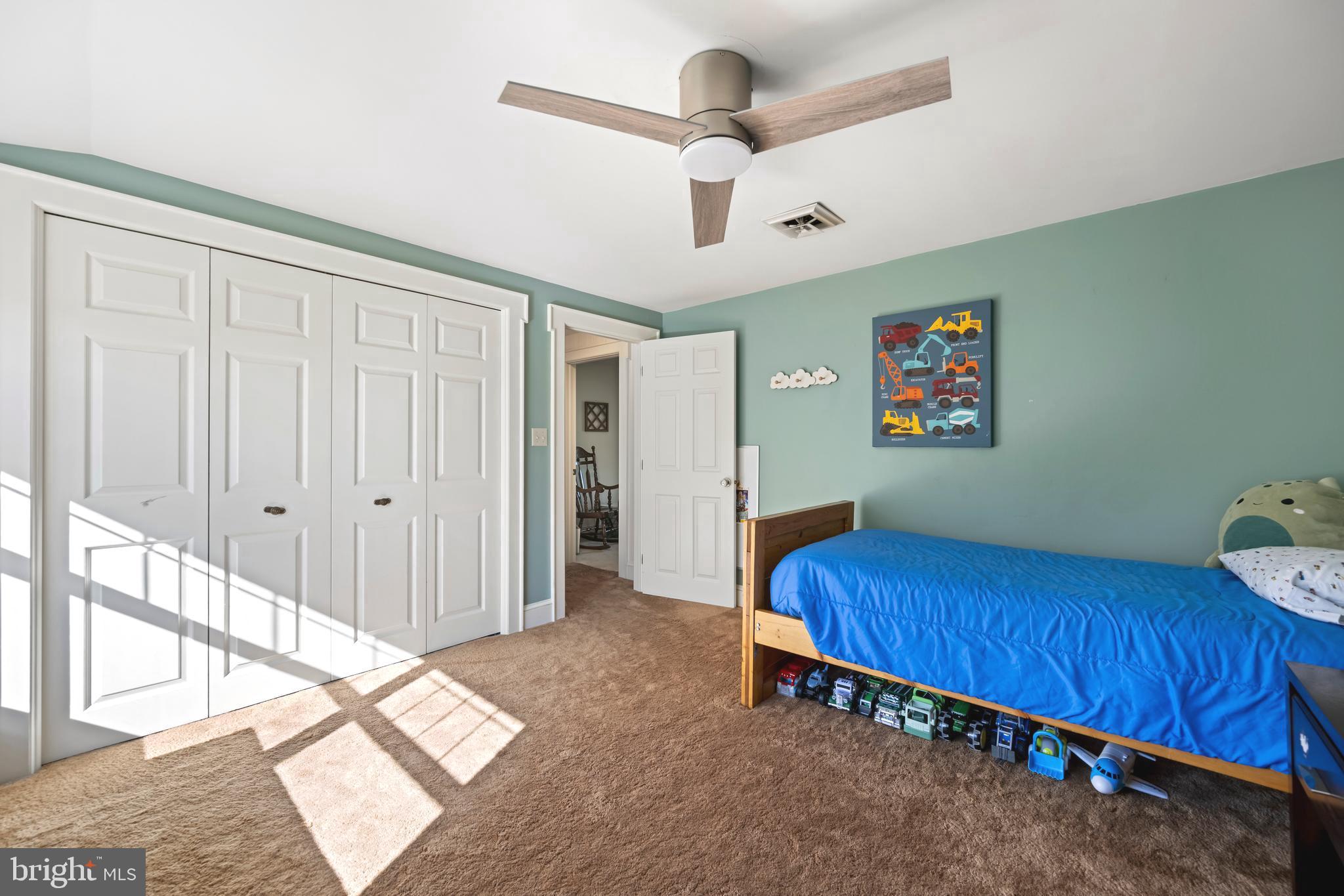 930 Johnson Road Salisbury, MD 21804 - Photo 58 of 69 a bedroom with furniture and a ceiling fan