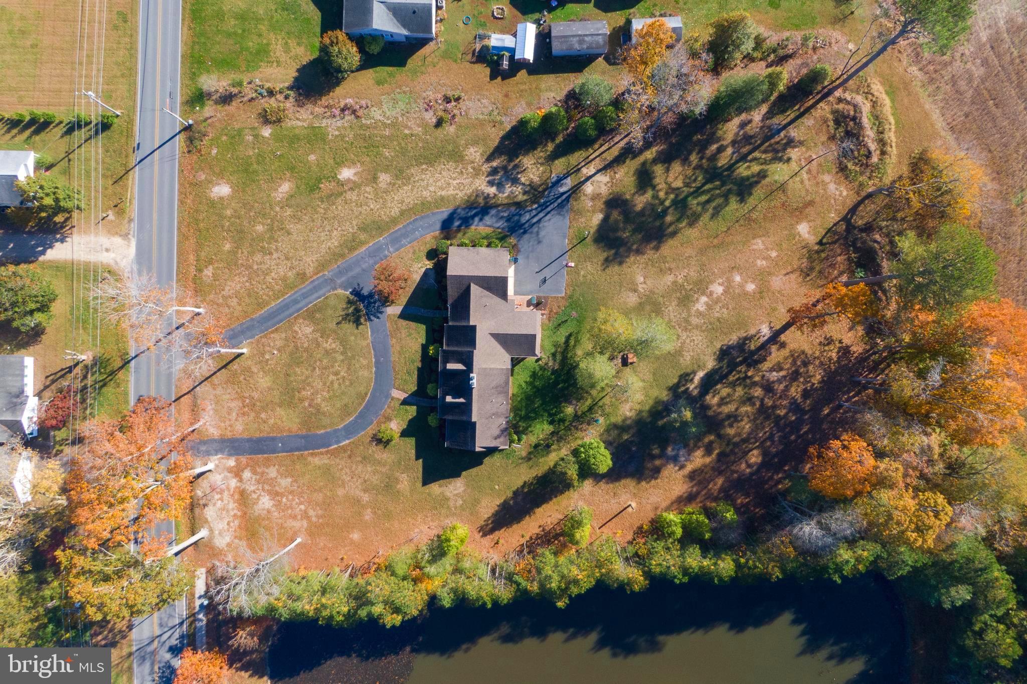 930 Johnson Road Salisbury, MD 21804 - Photo 6 of 69 an aerial view of a house with a yard and lake view