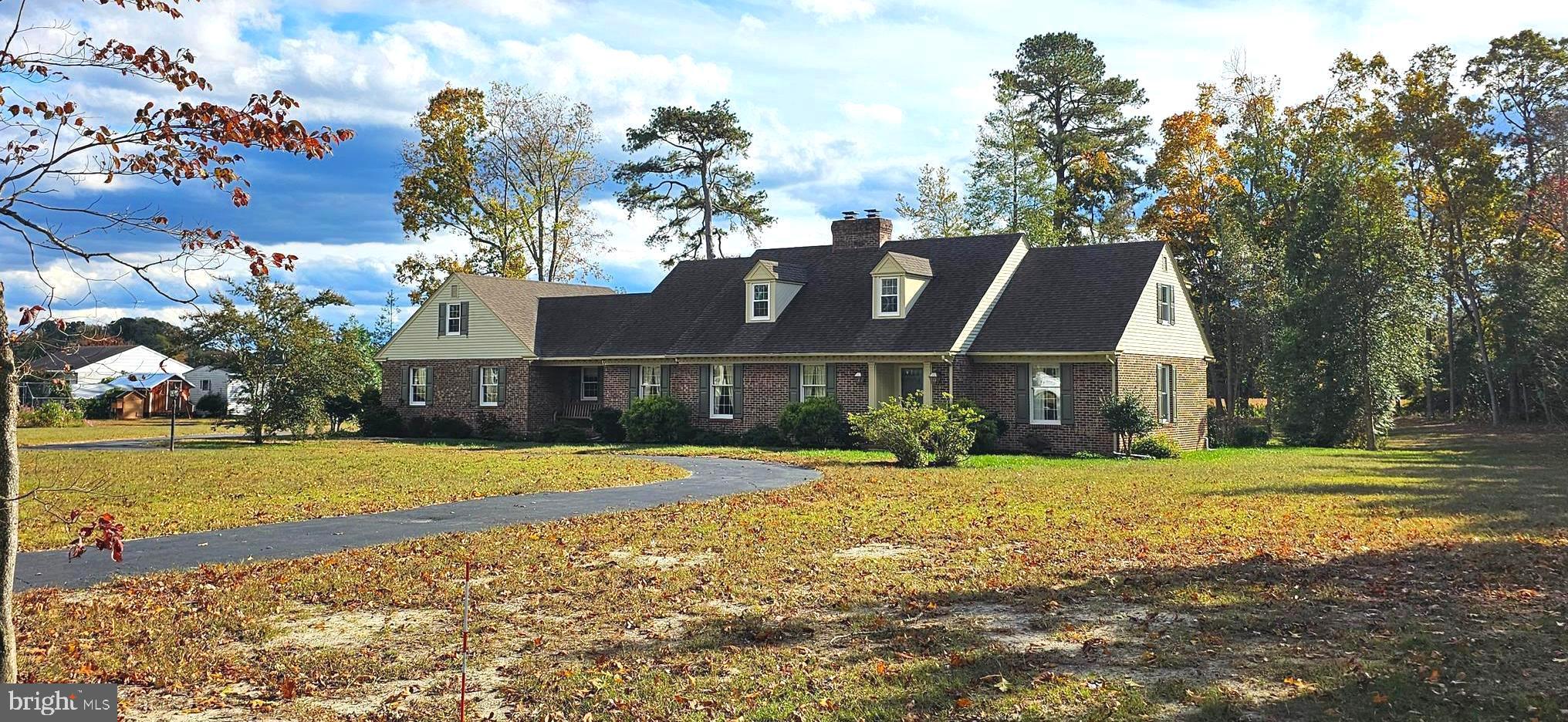 930 Johnson Road Salisbury, MD 21804 - Photo 62 of 69 a front view of house with yard and trees