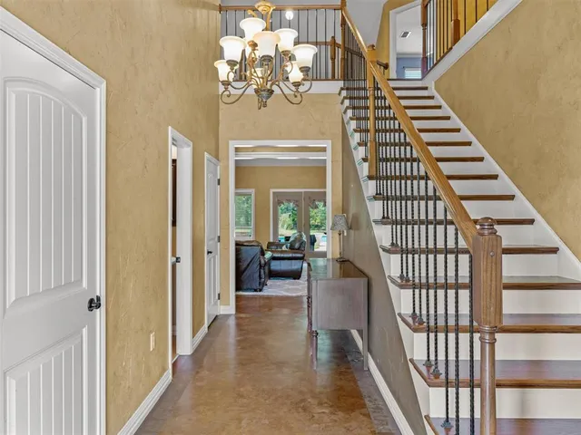 a view of a balcony with staircase