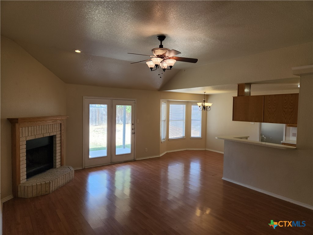 3407 Woodrow Drive Killeen, TX 76549 - Photo 2 of 10 a view of a livingroom with a ceiling fan window and hardwood floor