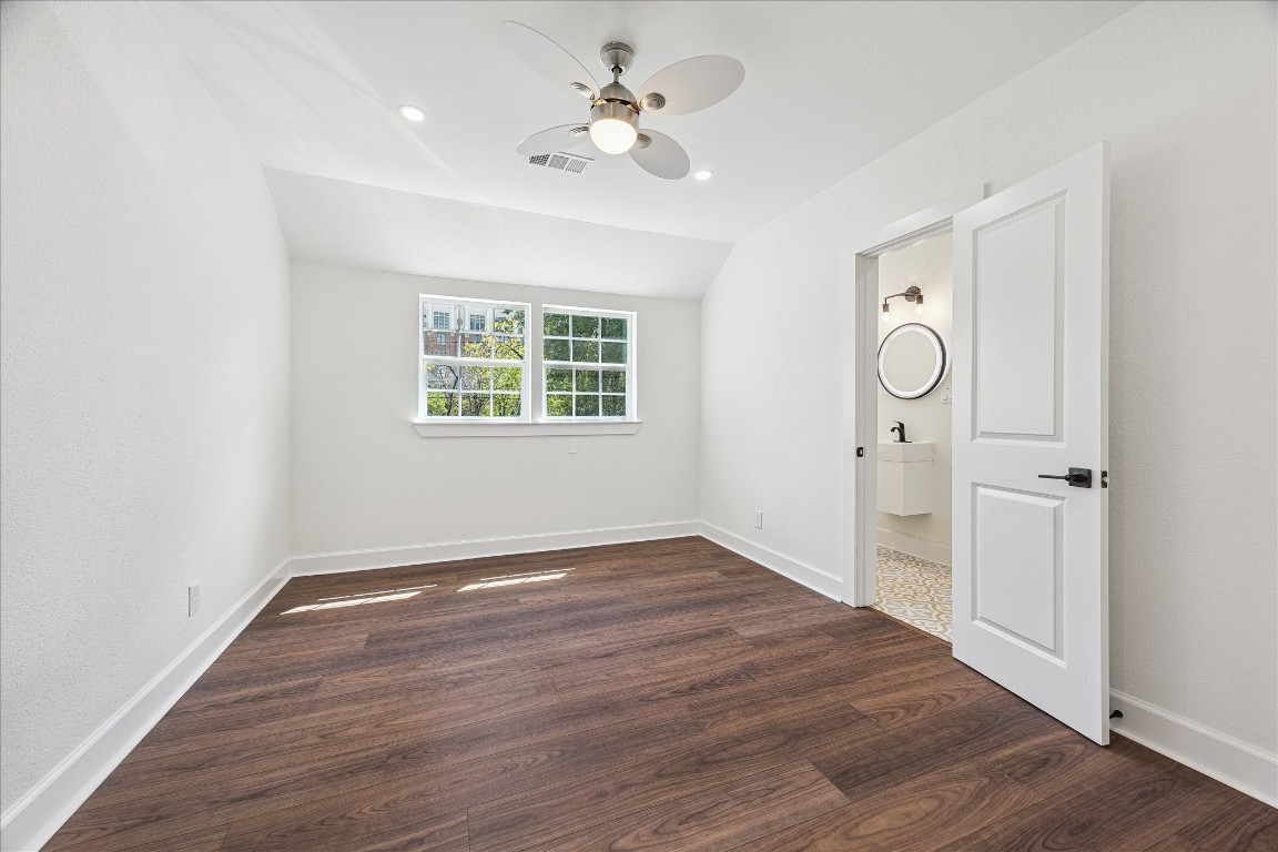 3071 Locke Lane Houston, TX 77019 - Photo 33 of 44 wooden floor in an empty room with a window