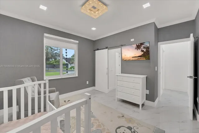 a view of room with furniture and windows